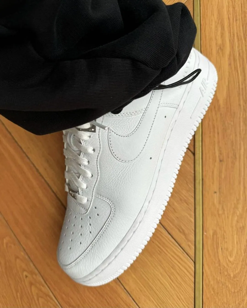 Matthew M. Williams' Nike Air Force 1 Low White color on feet
