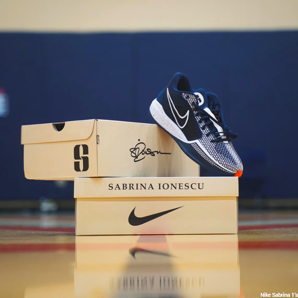 Navy Nike Sabrina 1 on shoe box